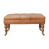 Buffalo Tan Leather Ottoman with Castor Legs