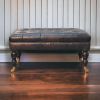 Buffalo Ash Black Leather Ottoman with Castor Legs